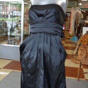 Black Strapless Satin stretch dress with a tie back bow by Lette Sz M